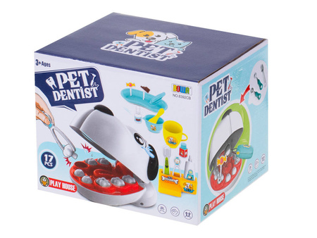 Piesek z chorymi ząbkami u dentysty wylecz ząbek pies dla dzieci