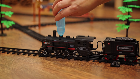 Kolejka elektryczna dymiąca pociąg lokomotywa z wagonami dla dzieci para wodna akcesoria DYM tor 7 metrów