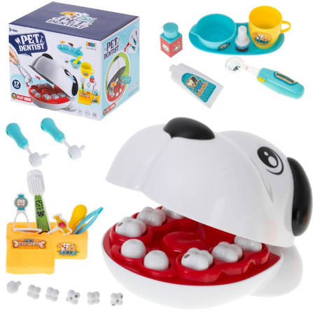 Piesek z chorymi ząbkami u dentysty wylecz ząbek pies dla dzieci