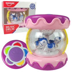 Różowy bębenek muzyczny interaktywny dla dzieci walec karuzela z muzyką